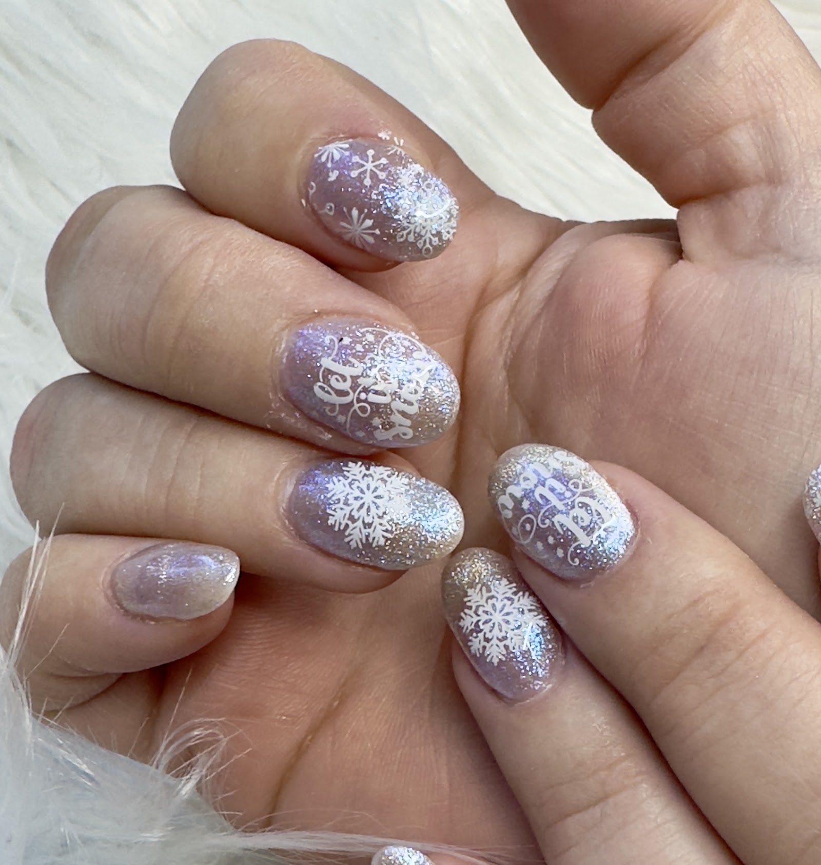 Tomilynns Nails logo